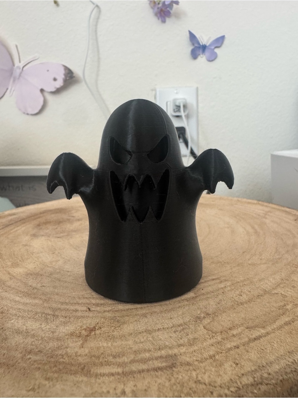 Black Ghost figurine.